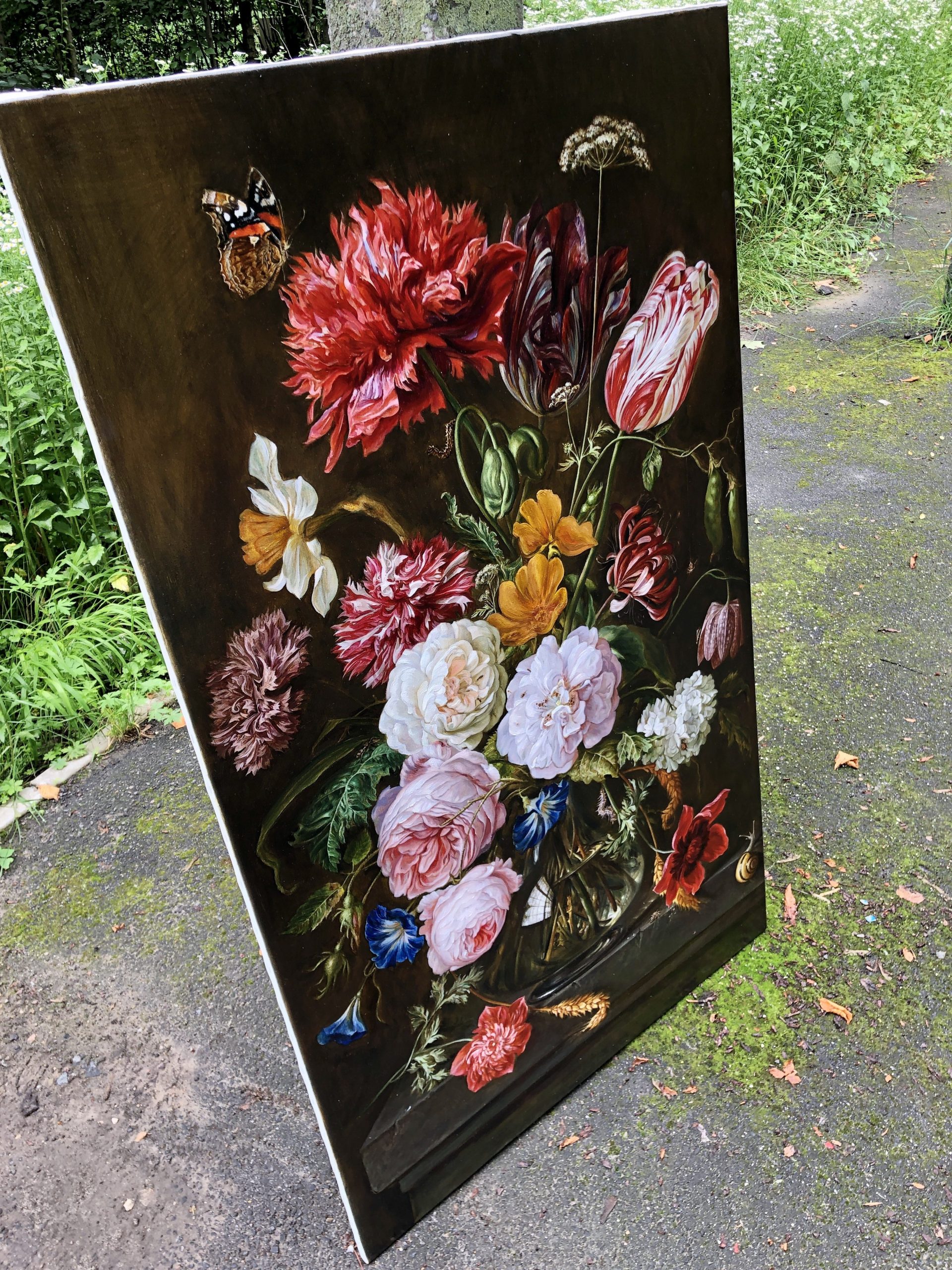 Large-scale classical floral oil painting on canvas displayed outdoors showing detailed butterfly and flower composition